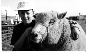 Rob Howell,aged 8 of Manselfield Farm, Murton with his prizewinning Ryeland.